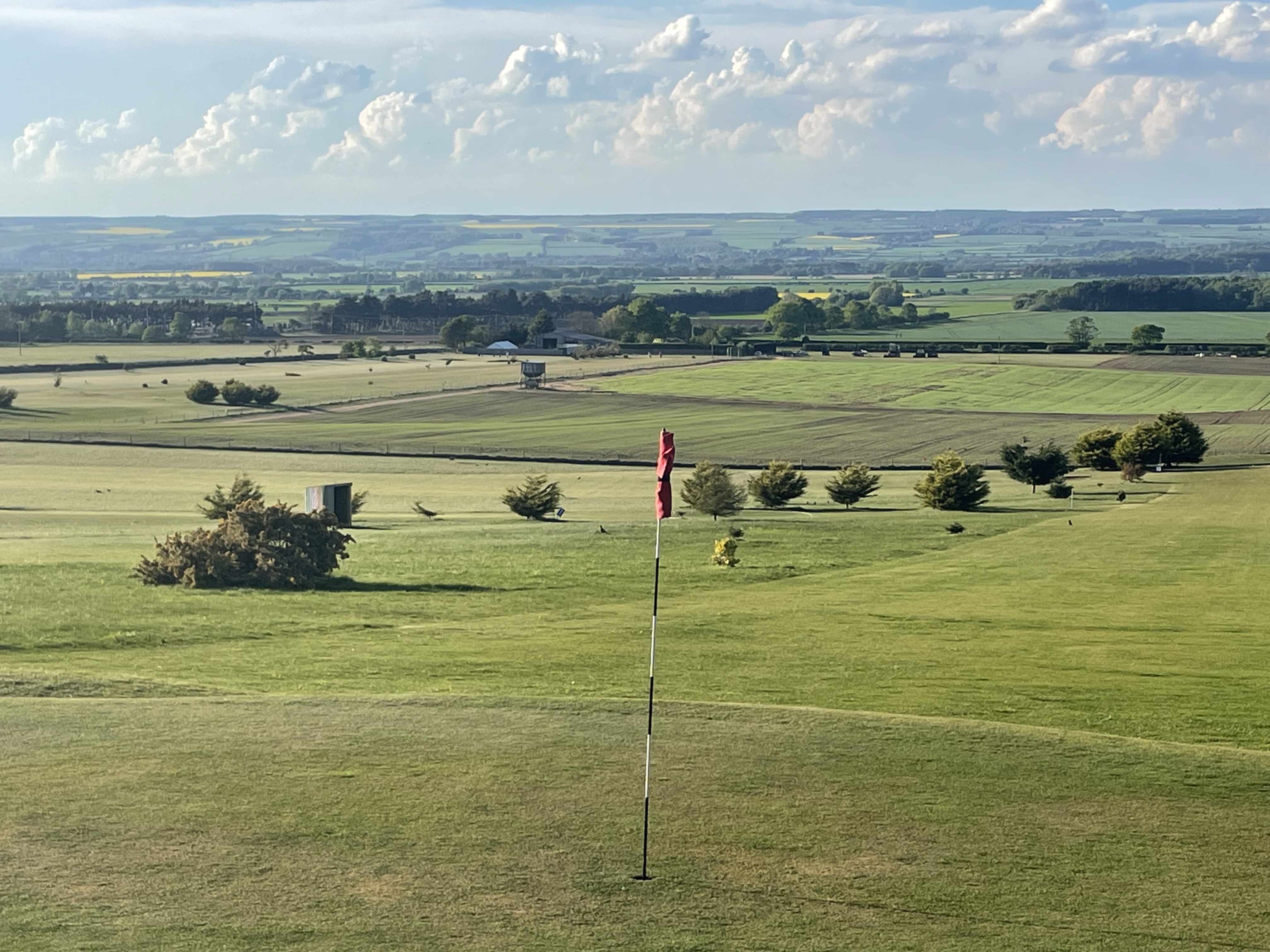 View across the course from the top of a hill